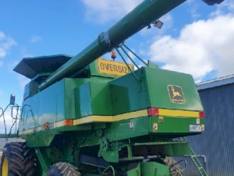 John Deere CTS Header with 930F front and trailer.